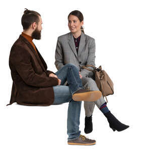 cut out man and woman sitting and talking casually