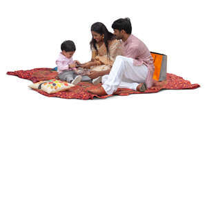 cut out indian family having a picnic