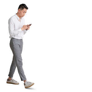 cut out young asian man walking with a phone in his hand