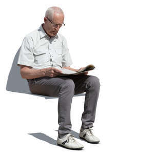 cut out elderly man sitting and reading a newspaper