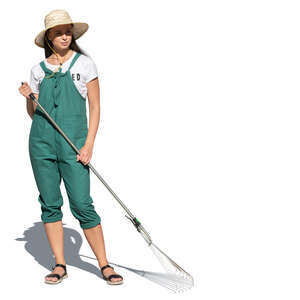 cut out woman with a rake working in a garden