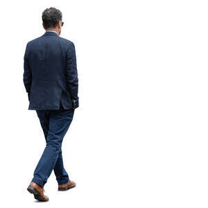 cut out man in a dark blue suit walking