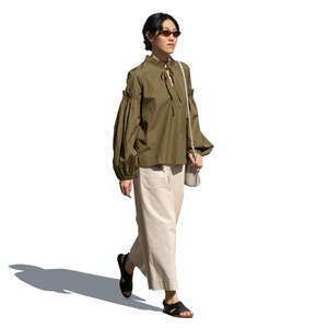 cut out asian woman walking on a sunny day