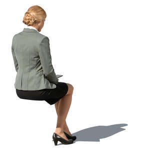 cut out businesswoman sitting seen from back angle