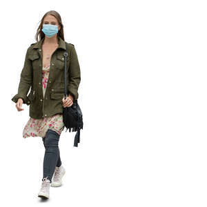 cut out woman with a face mask walking