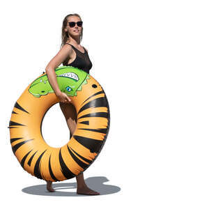 cut out woman with a big swim ring walking