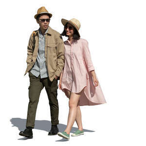 cut out young couple walking arm in arm on a summer day