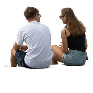 two cut out people sitting and talking seen from back angle