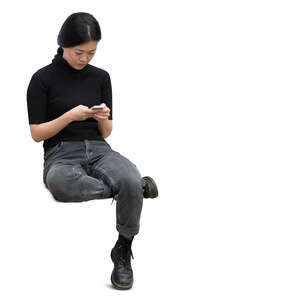 cut out woman sitting and typing something on her phone