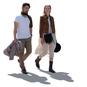 two cut out backlit people walking