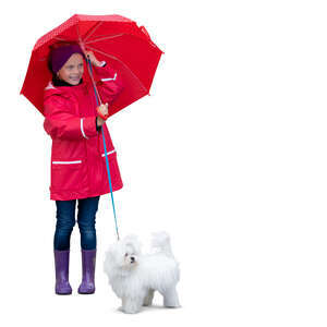 cut out little girl with a red umbrella and a small white dog standing and smiling