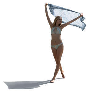 cut out backlit woman in a bikini holding a light towel up in the air