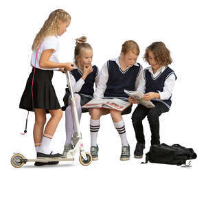 cut out group of school children sitting and reading