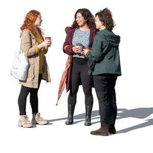 three cut out women standing and talking in autumn