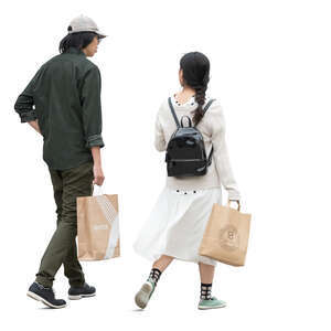 man and woman with shopping bags walking and talking