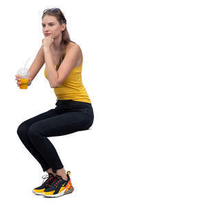 cut out woman sitting and drinking smoothie