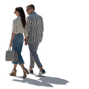 cut out backlit couple walking and holding hands