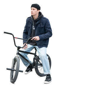 cut out young man with a bmx bike taking a break