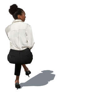 cut out businesswoman sitting seen from behind