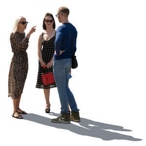 group of backlit young people standing