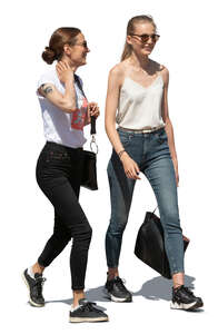 two cut out young women walking and talking