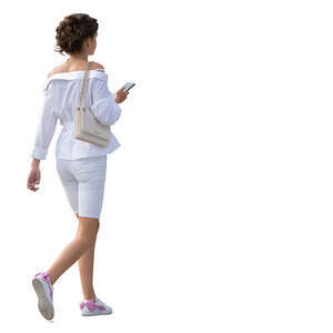 cut out woman in a white summer outfit walking