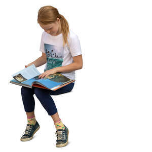 cut out girl sitting and reading a book