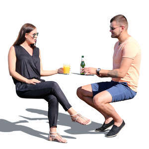 couple sitting in a street cafe