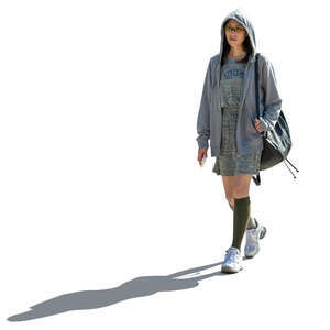 cut out asian wooman in a grey hooded jacket walking