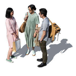 cut out group of three asian people standing and talking