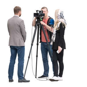 cut out television crew filming an interview