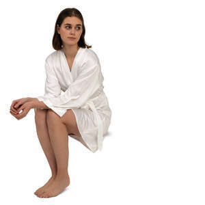 cut out woman in a white bathrobe sitting