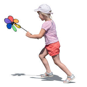 cut out little girl with a colorful toy playing