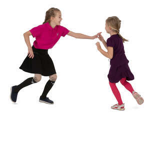 two cut out girls playing catch