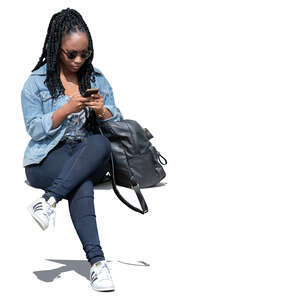 cut out woman sitting and checking her phone