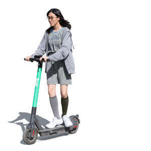 cut out young asian woman riding a scooter