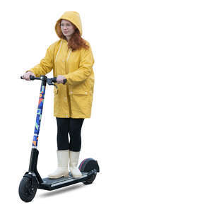 cut out woman in a yellow raincoat riding a scooter