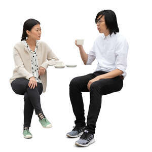 cut out asian man and woman sitting in a cafe and talking