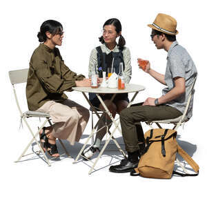 three cut out asian friends sitting in a cafe and talking