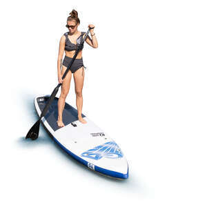 cut out woman paddleboarding seen from above