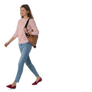 cut out woman in jeans and sweater walking