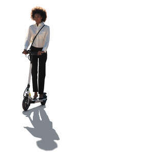 cut out backlit businesswoman riding a scooter