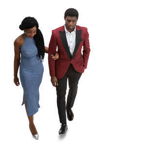 cut out black couple walking arm in arm at a forma event seen from above