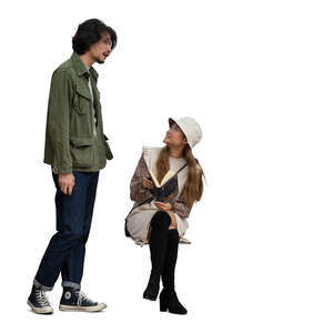 cut out woman sitting on a bench talking to a man standing beside her