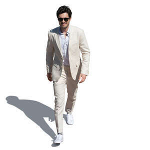 cut out man in a white suit walking seen from above