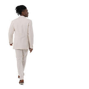 cut out black man in a white suit walking