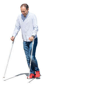 cut out man walking with crutches