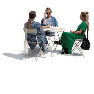 three cut out women sitting in a cafe and talking