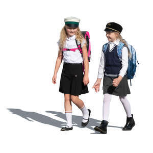 two cut out schoolgirls walking