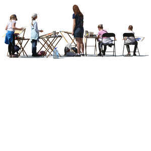 group of children painting outside